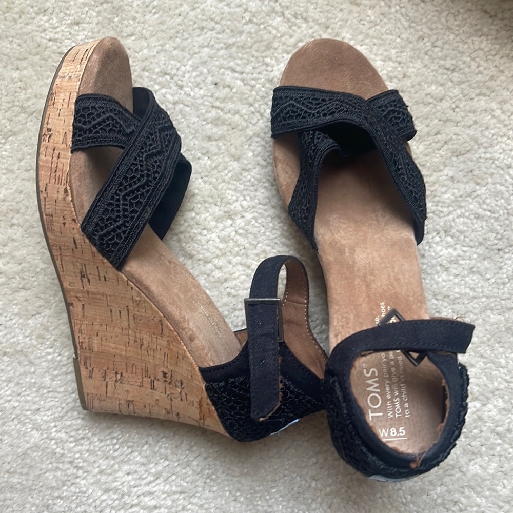 Toms wedge espadrilles- worn once. Minor scrape at toe. Narrow fit.